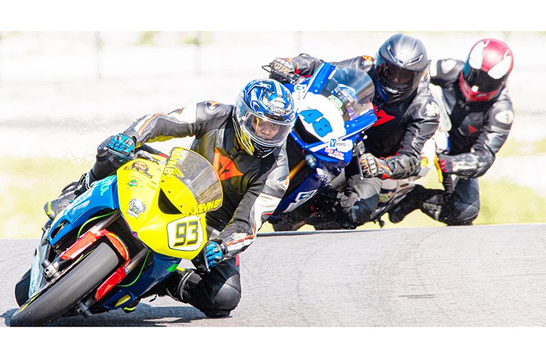 Kevin Persaud leads Matthew Vieira at a previous meet (Ackeem Thomas photo)