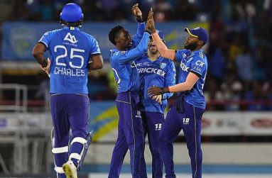 Khary Pierre (second left) celebrates the capture of one of his three wickets against the Antigua and Barbuda Falcons