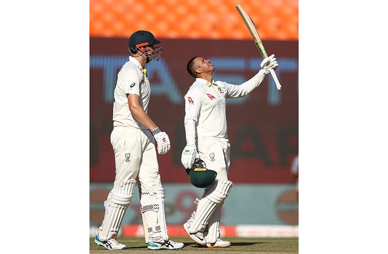 Usman Khawaja looks to the sky after reaching his century // Getty