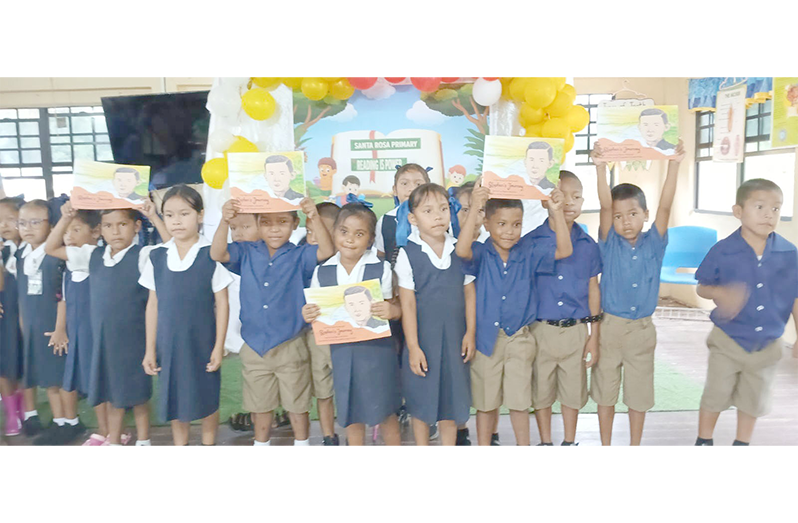 Children at Santa Rosa Primary with the Stephen Campbell storybook