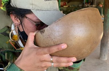 Enjoying a calabash of some good, strong Kari