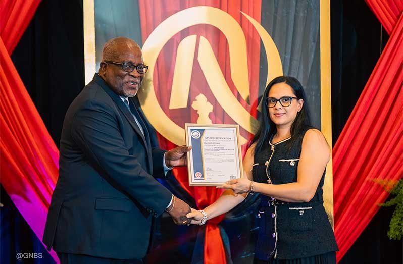 Alyssa Singh receives the GYS901 certificate from Prime Minister, Brigadier (Ret'd) Mark Phillips, at this year's NQA