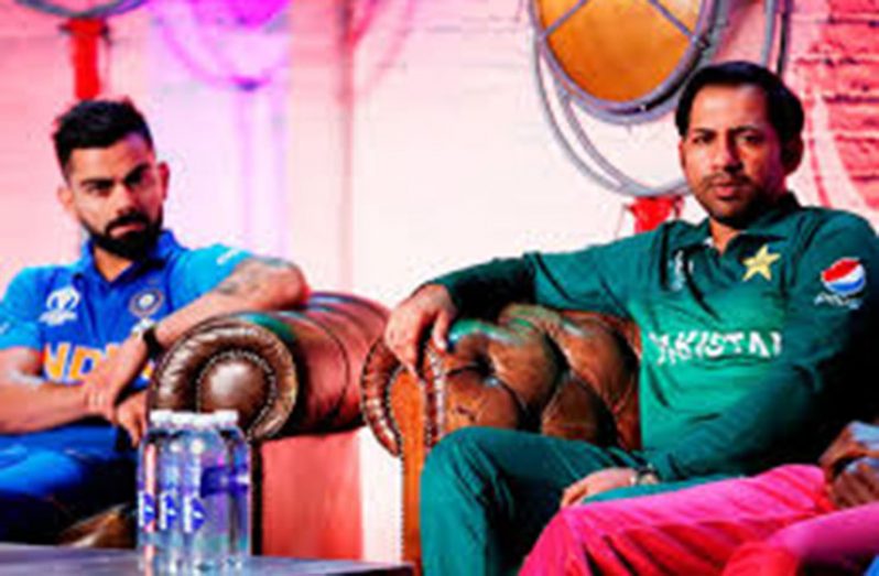 Pakistan's Sarfaraz Ahmed and India's Virat Kohli during the captains’ press conference. (Action Images/Andrew Boyers)