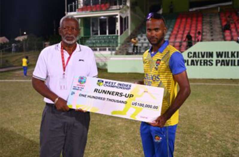 Barbados Pride captain Kraigg Brathwaite (right) accepts the runner-up prize after they finished second in the West Indies Championship (Photo courtesy CWI Media)