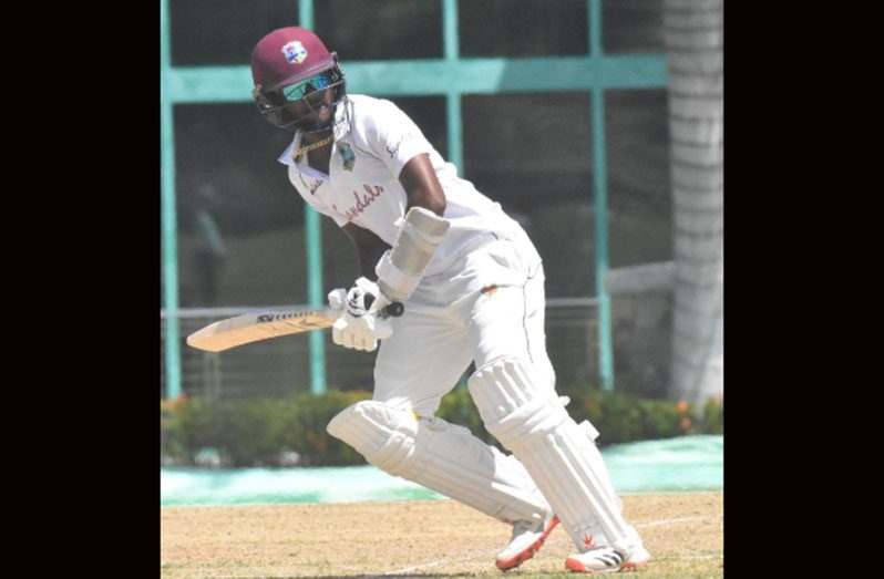 Opener Kraigg Brathwaite gathers runs through the on side during his 95.