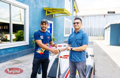 Kristian Jeffrey (left) receives the sponsorship cheque from Sachin Puri of Continental Group of Companies, the manufacturers of Torginol Paints
