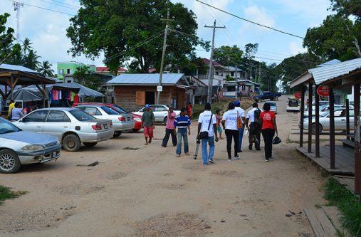 Residents in the market area of Kumaka, Region One