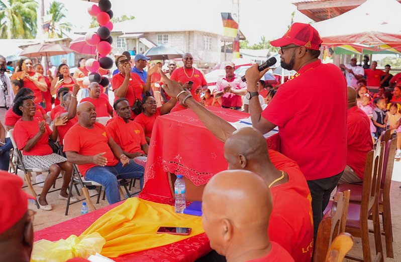 President, Dr. Irfaan Ali, addressing residents of Kwakwani during a public meeting on Saturday (Office of the President photos)