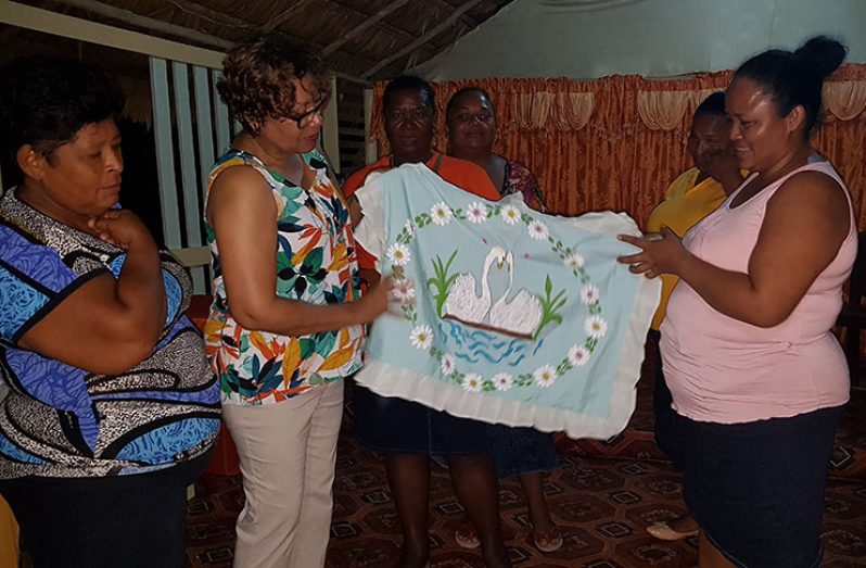 Minister within the Ministry of Indigenous Peoples’ Affairs, Valerie Garrido-Lowe, engages with the women and their creations
Handicraft done by the Kwakwani Women’s Group