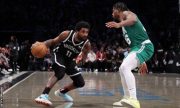 Kyrie Irving (left) only played a handful of home games for Nets last season because of New York's vaccine mandate
