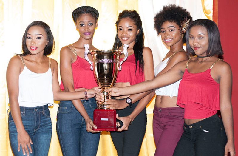 Road to Mecca models and the championship trophy at yesterday’s launch (Delano Williams photo)