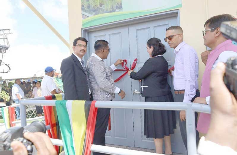 Lab Minister of Agriculture, Zulfikar Mustapha; Minister within the Ministry of Agriculture, Vikash Ramkissoon and other officials cut the ribbon to open the new, modern, state-of-the-art Tissue Culture Lab on Tuesday (DPI photos)