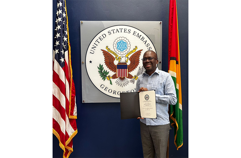 Chief Executive Officer (CEO) of the Board of Industrial Training (BIT) under the Ministry of Labour and Manpower Planning, Richard Maughn, displays his certificate after completing the IVLP. According to him, the experience reinforced his belief that Guyana is on track to building a world-class workforce