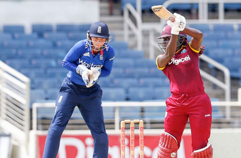 England Wicketkeeper,Amy Jones,watches on as Stafanie Taylor drives off the back-foot. (Photo by WICB Media/Athelstan Bellamy)