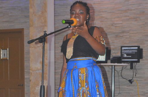 Reciting her poem “Race, Poverty, and Freedom” landed Pearlita Richardson in third place