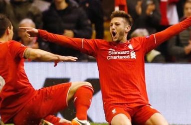 Adam Lallana celebrates scoring Liverpool's third goal against Villarreal