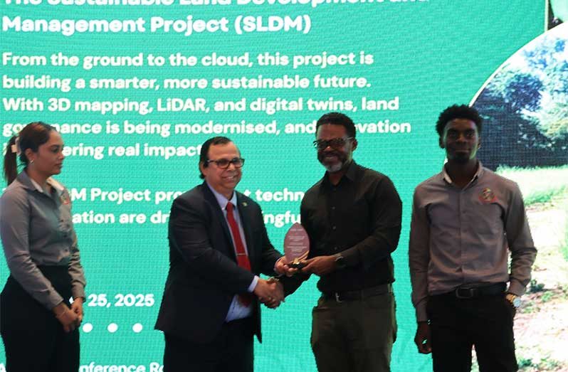 Chief Executive Officer and Commissioner of the Guyana Lands & Surveys Commission, Enrique Monize, (second from left) on Tuesday revealed that some 30,000 requests have been made for land in the Soesdyke-Linden Highway area