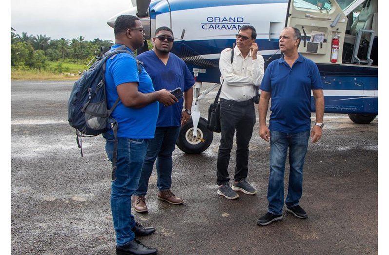 (From right) Surgeon Dr. Amir, Director General Dr. Vishwa Mahadeo; Regional Health Officer, Dr. Steven Cheefoon, and Mr Gouveia upon landing in Moruca for the first ever surgeries at the Moruca Hospital