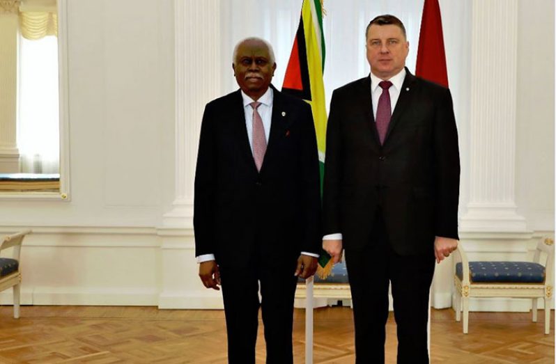 President of Latvia, His Excellency Raimonds V?jonis, and Ambassador Frederick Hamley Case