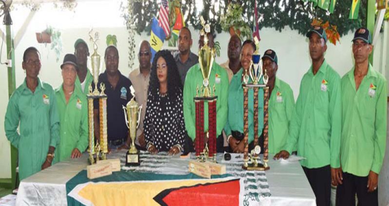 President of the GDA and organiser of the upcoming International Tournament Faye Joseph (6th left) and WDC representative Gregory Bledman (4th left) pose with members of the Organising Committee.