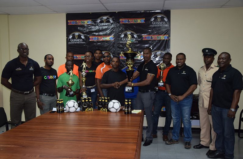 Guinness representatives stand with various team officials and the organising committee at the launch of the 6th Colours/Guinness Greatest of the Streets football tournament.