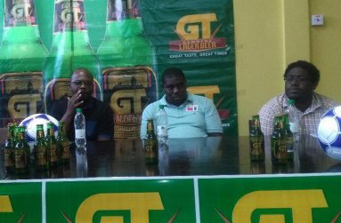 From left is UDFA President Terrence Mitchell; Banks DIH Supervisor Shawn Grant; and Treasurer of the UDFA,  Aswatt Barrett; at the launch of the GT Beer Football Tournament on Saturday.