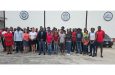 Some of the participants of the recently commenced second edition of the Lifeguard Certification Programme stand with Director of Sport Steve Ninvalle