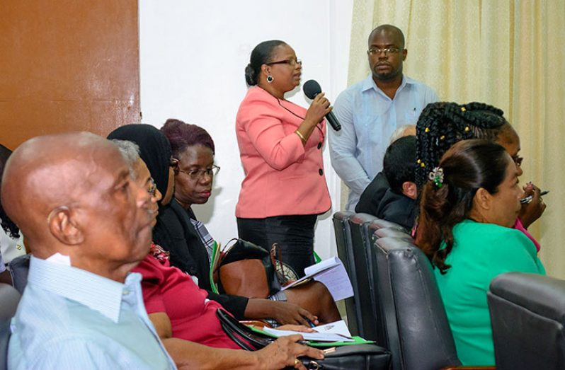 Minister of Social Protection Volda Lawrence asking a question during the forum