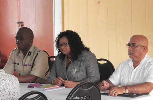 Minister of Public Health, Volda Lawrence [center]  flanked by Commander Leslie James and REO Denis Jaikaran
