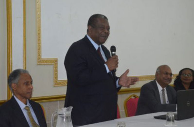 President of the Caribbean Court of Justice, Sir Dennis Byron, addressing participants at the two- day seminar (GINA photos)