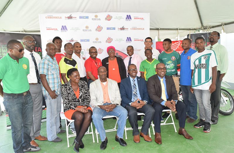 Sponsors, players and club officials pose with top brass of the GFF. Seated (L to R): Ms Tandi McAllister (3rd VP), Retired Brigadier Bruce Lovell (1st VP), President Wayne Forde and Rawlston Adams (2nd VP).