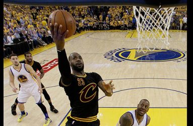 LeBron James scores 41 points as the Cleveland Cavaliers defeat Golden State Warriors 112-97.