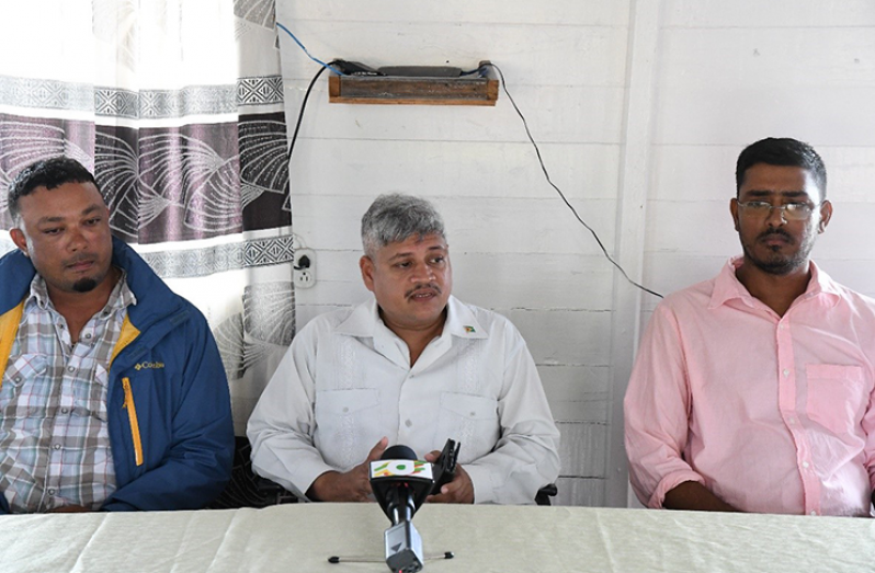 From right: Mr. Seenarine Nandram, Region Three Sea and River Defence Engineer; Hon. Jaipaul Sharma, Minister within the Ministry of Public Infrastructure; and Mr. S. Maraj from Maraj Construction Company