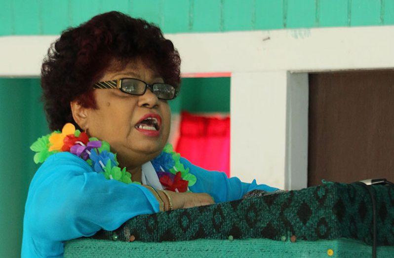 Minister of Social Protection Amna Ally delivering remarks at Leguan