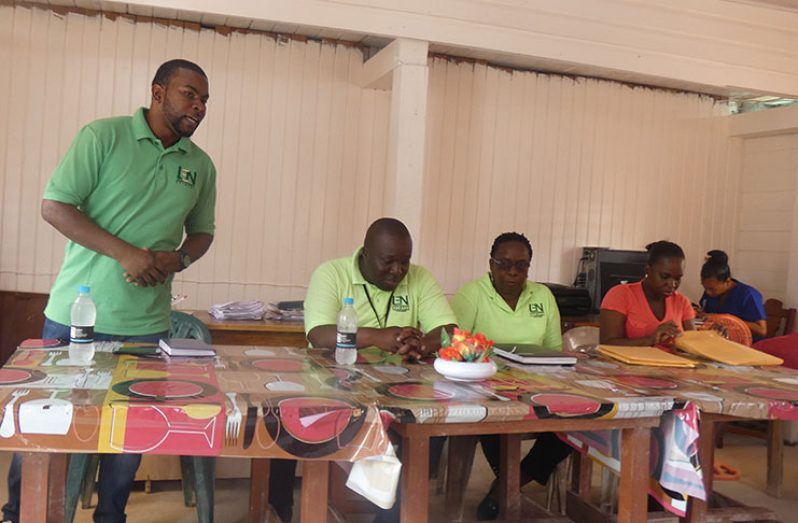 LEN officers addressing residents of Aroaima during their outreach on Tuesday