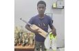 Emmanuel Lewis poses with his gifts.