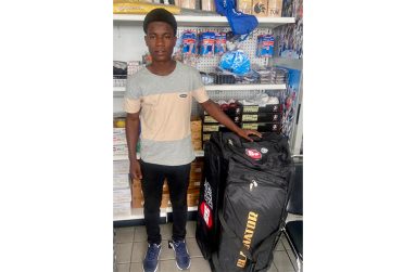Emmanuel Lewis poses with new gear bag