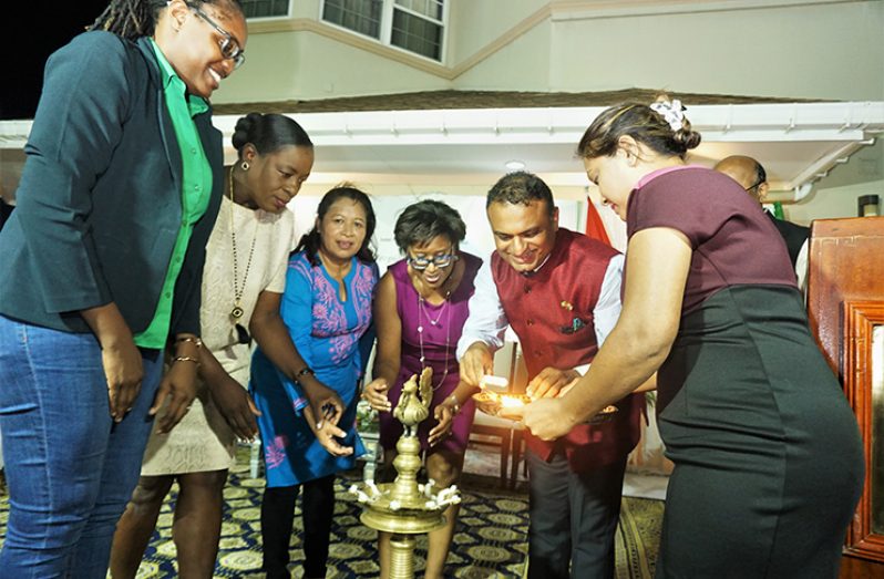From left: Public Service Minister, Tabitha Sarabo-Halley; Education Minister, Dr. Nicolette Henry; Minister of State, Dawn Hastings-Williams; Public Telecommunications Minister, Catherine Hughes; and Indian High Commissioner to Guyana, Dr. KJ Srinivasa participate in a light ceremony before the commencement of the ITEC Day event (Elvin Croker photo)