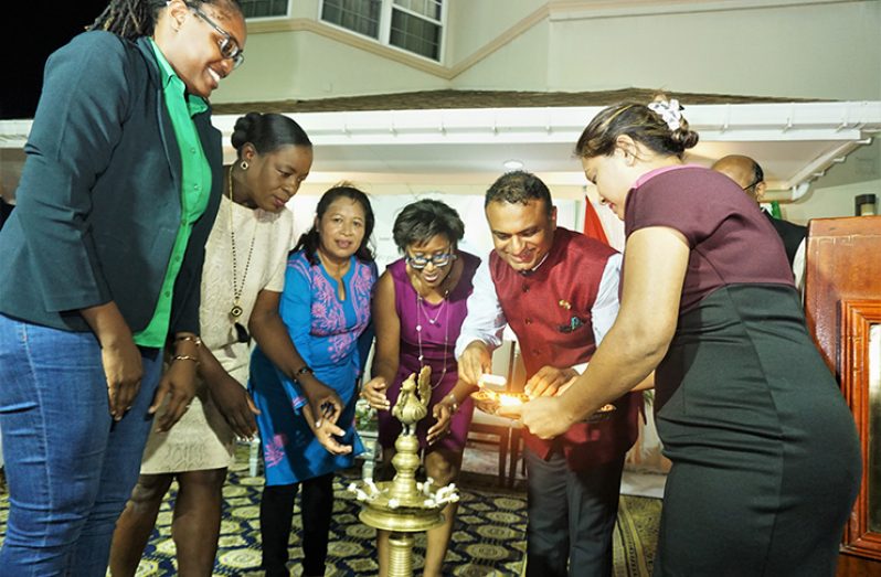 From left: Public Service Minister, Tabitha Sarabo-Halley; Education Minister, Dr. Nicolette Henry; Minister of State, Dawn Hastings-Williams; Public Telecommunications Minister, Catherine Hughes; and Indian High Commissioner to Guyana, Dr. KJ Srinivasa participate in a light ceremony before the commencement of the ITEC Day event (Elvin Croker photo)