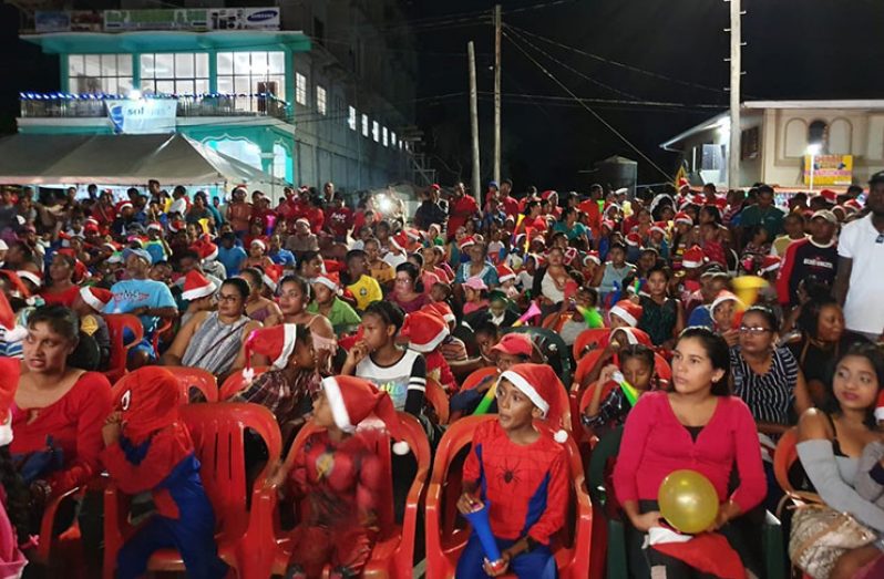 Patrons patiently awaiting the lighting of the tree