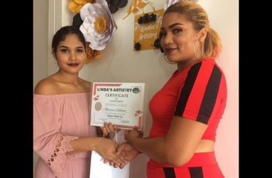 Zenelly Kellawan  (left) along with one of her students