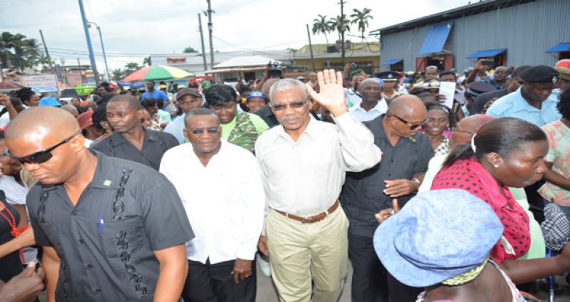 President David Granger and Region 10 Chairman Renis Morian during the walkabout at the Mackenzie Market area on Friday