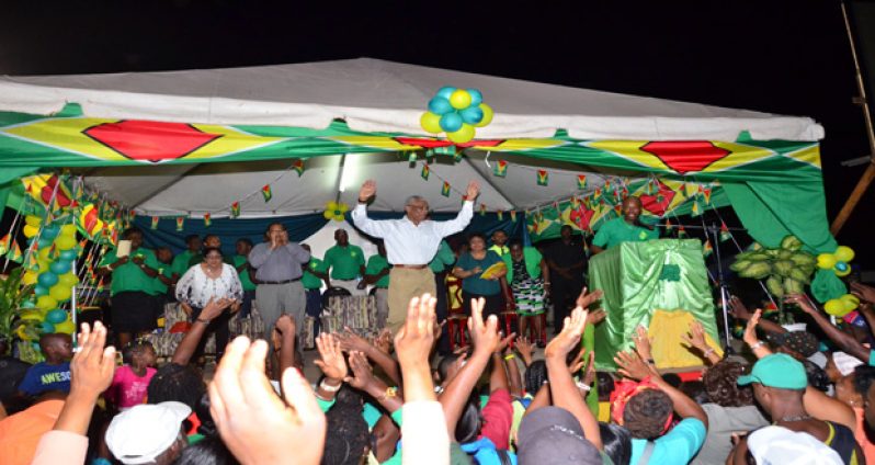 A jubilant President David Granger and his APNU-AFC entourage take to their feet at the end of last night’s meeting in Linden (Photo by Adrian Narine)