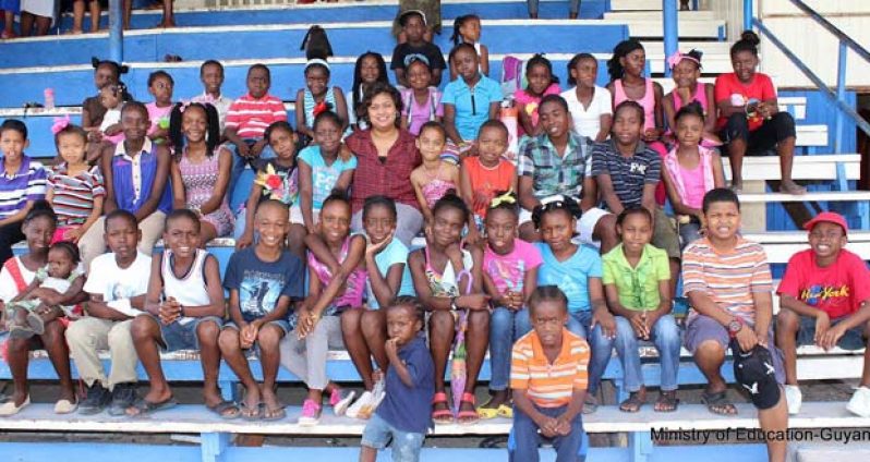 Minister of Education with Children of the One Mile Primary School at Bay Rock Community Centre