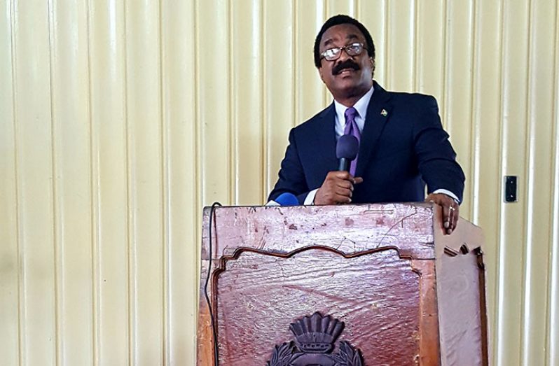 Attorney General and Minister of Legal Affairs, Basil Williams addressing the audience