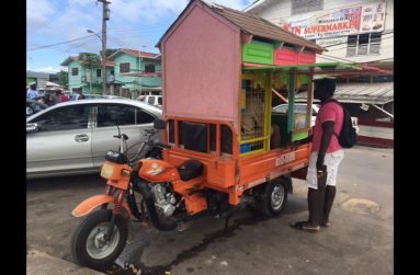 This unique three-wheel mobile cake shop is operated around Linden by another enterprising self-employed citizen. (Photo by Francis Quamina Farrier)