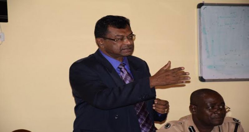 Minister of Public Security Khemraj Ramjattan addressing the meeting at City Inn Hotel, Line Path, Skeldon