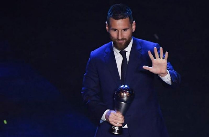 Argentina and Barcelona forward Lionel Messi reacts after winning the trophy for the Best FIFA Men's Player of 2019 Award in Milan. Photo: AFP
