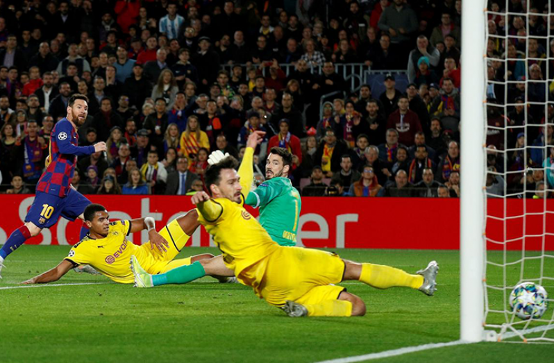 Barcelona's Lionel Messi scores their second goal at Camp Nou, Barcelona, Spain. (REUTERS/Albert Gea)