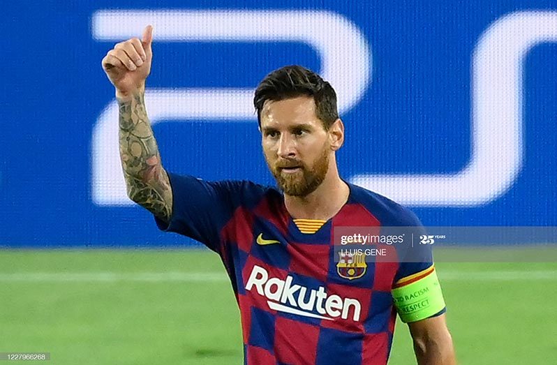 Barcelona's Argentine forward Lionel Messi celebrates after scoring a goal during the UEFA Champions League round of 16 second-leg football match against Napoli at the Camp Nou stadium in Barcelona on August 8, 2020. (Photo by LLUIS GENE/AFP) (Photo by LLUIS GENE/AFP via Getty Images)